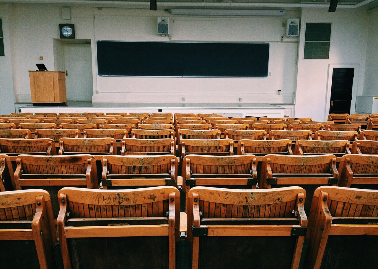 An empty college lecture hall, representing the possibility of online only post secondary schools in the US