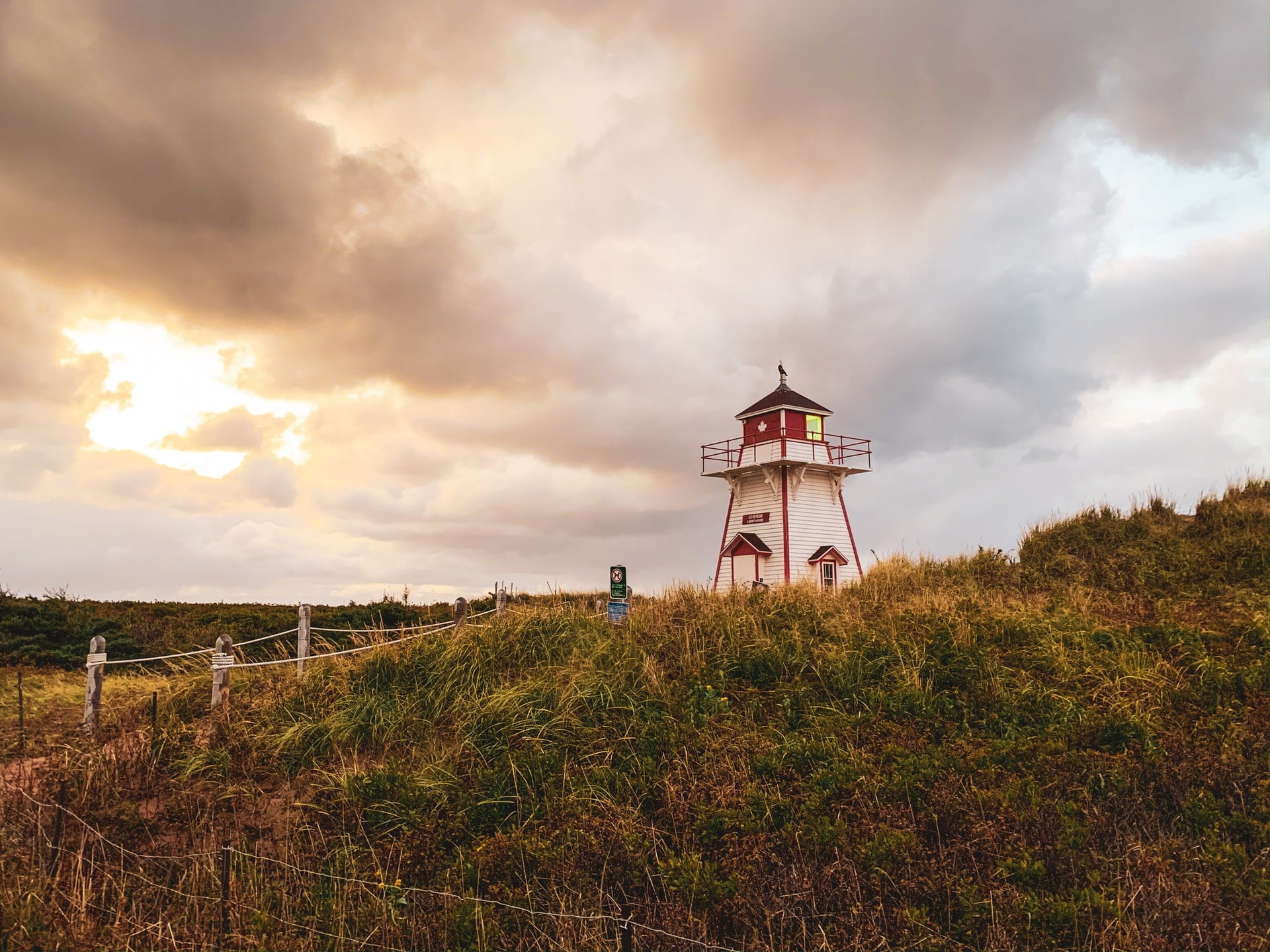 A lighthouse in PEI, Canada, representing domestic summer travel