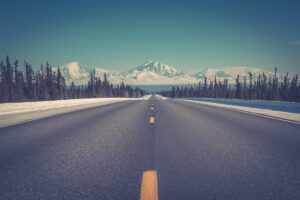 A highway in Alaska representing Americans travelling through Canada to access Alaska during COVID-19