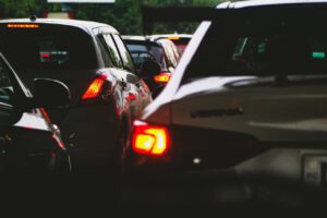 Cars stopped in line representing long lines at covid testing centres and the ongoing border closure