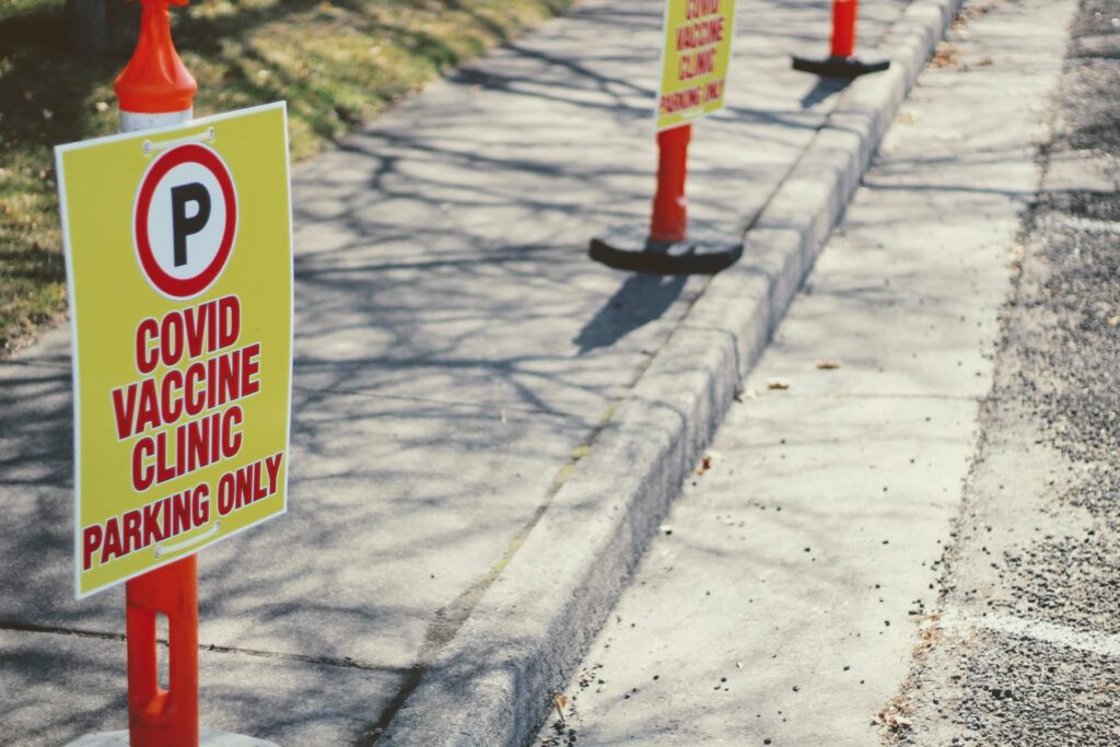vaccination signs representing canada lifting quarantine requirements for fully vaccinated canadians