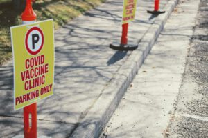 vaccination signs representing canada lifting quarantine requirements for fully vaccinated canadians