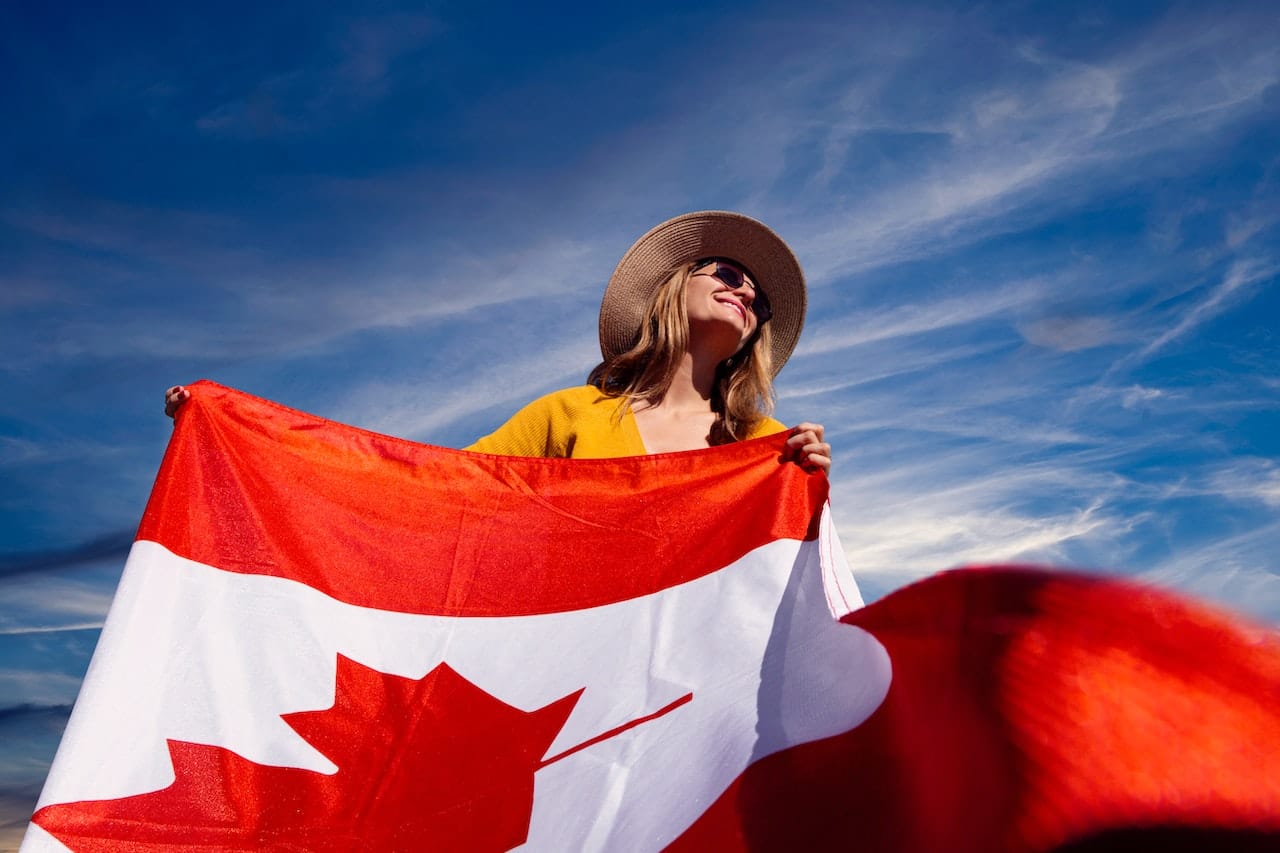 girl holding canada flag