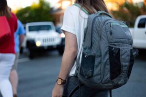 Backpack on student representing immigration related scams by international students